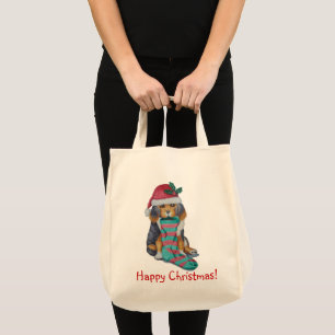 schattige zwarte pupil gekleed voor kerstmis tote bag