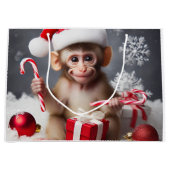 Schattigee aap met een kerstmuts groot cadeauzakje (Voorkant)