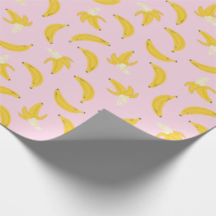 Schattigee bananen op licht roze cadeaupapier