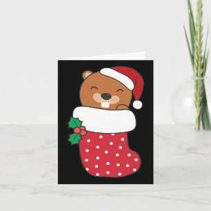 Schattigee bevers in kerstkousen voor kerst kaart
