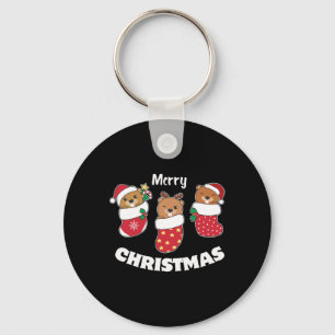 Schattigee bevers in kerstkousen voor kerst sleutelhanger
