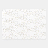 Schattigee gouden en zilveren hart charmes op wit inpakpapier vel (Voorkant 3)