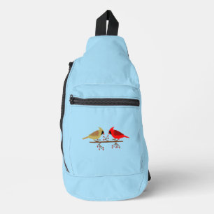 Schattigee kerstkardinalen en rode bessen sling bag