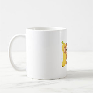 Schattigee kleine aap en banaan koffiemok