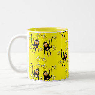 Schattigee kleine aap en bananen tweekleurige koffiemok