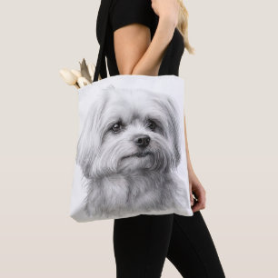 SCHATTIGEE KLEINE WITTE MALTESE PUPPYHOND DRAAGTAS