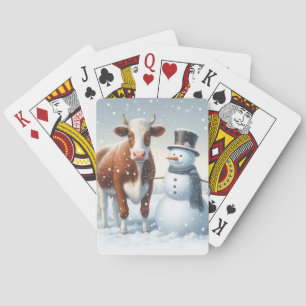 Schattigee koe en sneeuwman in het winterveld pokerkaarten