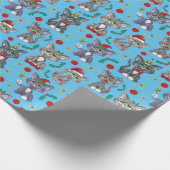 Schattigee koele kerstkat in blauw cadeaupapier (Hoek)