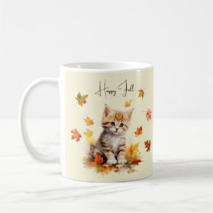 Schattigee Oranje Tabby Kitten in herfstbladeren Koffiemok