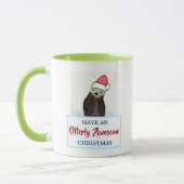 Schattigee otter met een kerstmuts mok (Links)