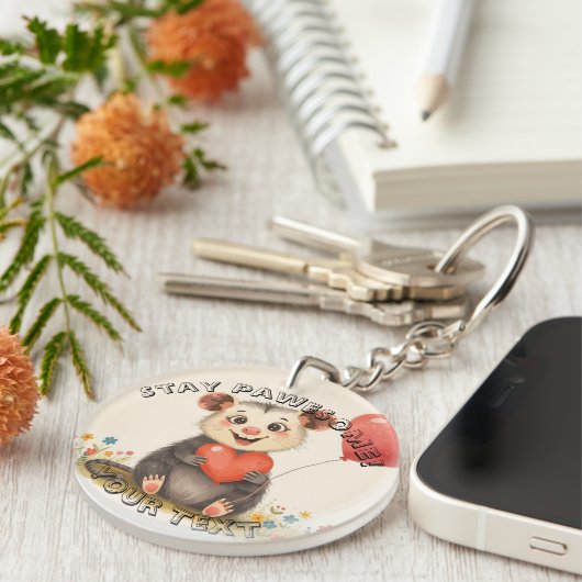 Schattigee Possum Sleutelhanger – Blijf Pawesome (Voorkant Rechts)