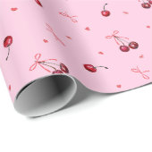 Schattigee rode kersen harten bogen op roze cadeaupapier (Rol Hoek)