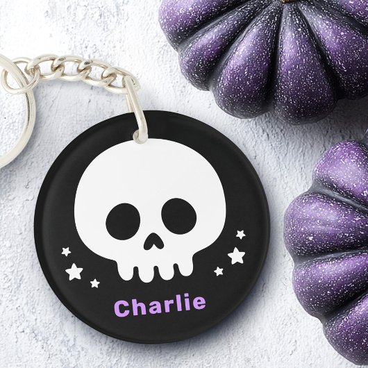 Schattigee schedel met sterretjes en paarse naam sleutelhanger