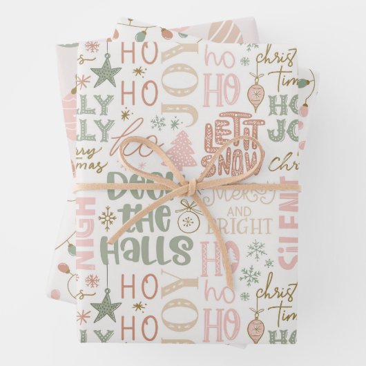 Schattigee set roze en salie groene kerst inpakpapier vel (In situ)