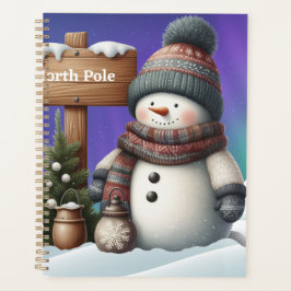 Schattigee sneeuwman op Noordpool met noorderlicht Planner