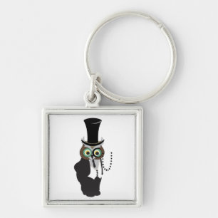 Schattigee uil met monocle sleutelhanger