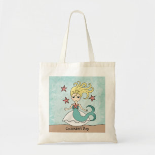 Schattigee zeemeermin op een schaal met zeester tote bag