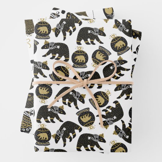 Schattigee zwart en gouden kerstpatronen inpakpapier vel (In situ)