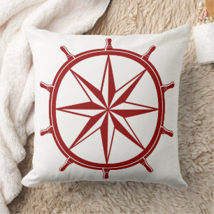 Scheepsstuurwiel in nautische rood op wit kussen