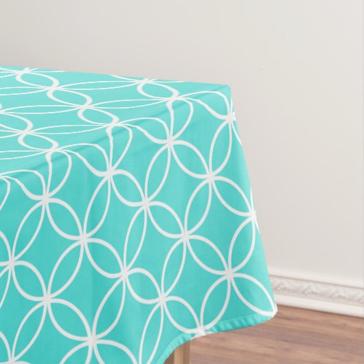 Scherpe witte doorsnede cirkels op blauwgroen zeeb tafelkleed (Voorbeeld)