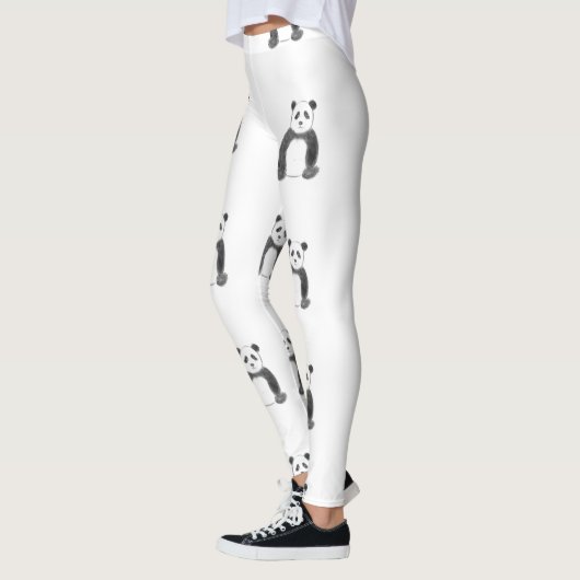 Schets van zwarte en witte panda leggings (Links)