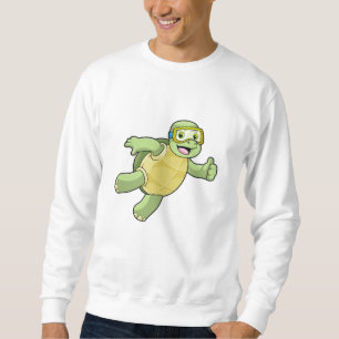 Schildpad bij zwemmen met zwembril trui