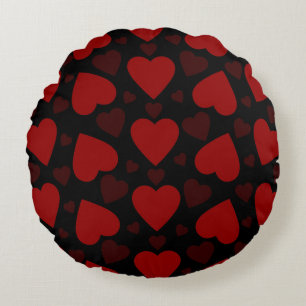 Schitterend rood hartpatroon op zwart rond kussen