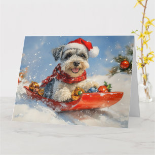 Schnauzer-hond in slee Laat het sneeuwen Kerstmis Kaart