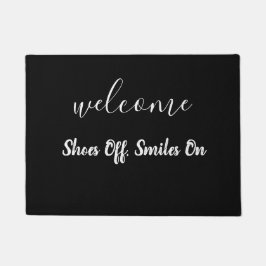 Schoenen uit, glimlacht aan deurmat