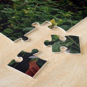 Schootse kat op een kruk in een kas legpuzzel (Zijkant)