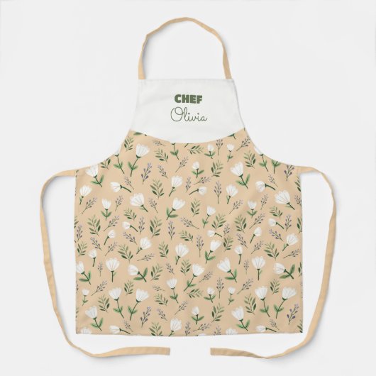 Schort met eigen naam – Vanille bloemenprint (Voorkant)