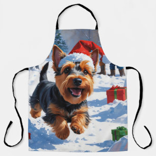 Schotse Terrier Rent Door Sneeuw met Kerstmuts Schort