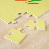 Schudde leeuw in het gras met kinder ladybug legpuzzel (Zijkant)