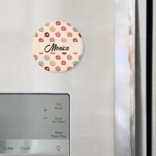 Schuddecoratieve donuts op roze magneet
