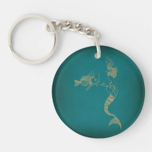 Schudzeemeermin met geïllustreerde vis sleutelhanger
