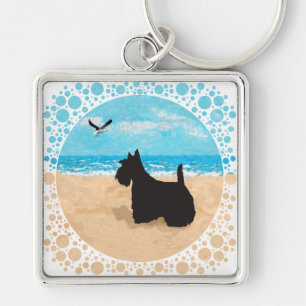 Scottie op het strand met meeuw sleutelhanger