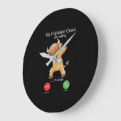 Scottish Highland Cow roept Grote Klok (Hoek)