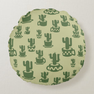 Sculptuur van sappige cactus in cups en potten rond kussen