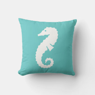 SEAHORSE BLANC sur oreiller bleu sarcelle