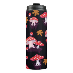 Seamless pattern with fly agaric and maple leaves. thermosbeker