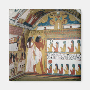 Sennedjem en zijn vrouw tegenover een naos magneet