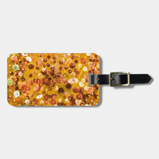Sequins en spelden bagagelabel