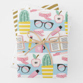 Série de papier à envelopper bleu et or pour écoli (En situation)