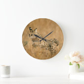 Serval (Leptailurus Serval) springt Grote Klok (Huis)