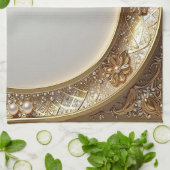 Serviette de cuisine dorée ornée (Plié)