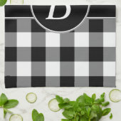 Serviette de cuisine noire et blanche de (Plié)