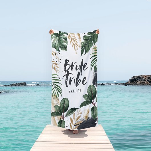 Serviette de plage avec feuille tropicale et typog