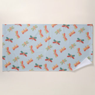 serviette de plage avec un motif joyeux de libellu