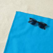 Serviette de plage bleu ciel (En situation)