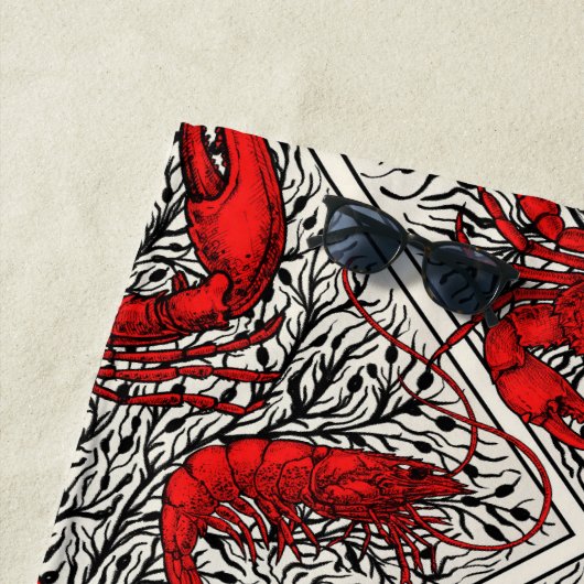 Serviette De Plage Crustacés en rouge, noir et ivoire (En situation)